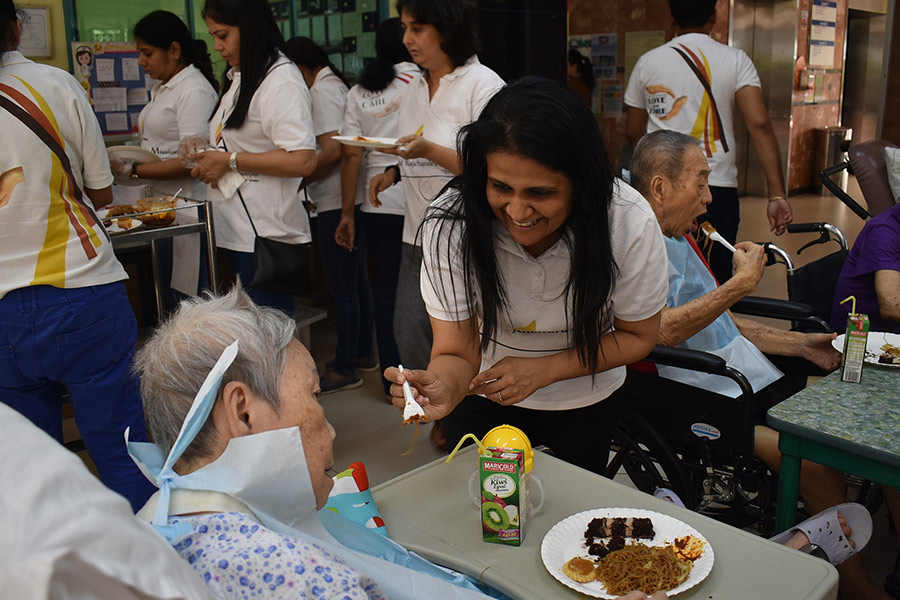 Spreading smiles at an Elderly Home in Singapore