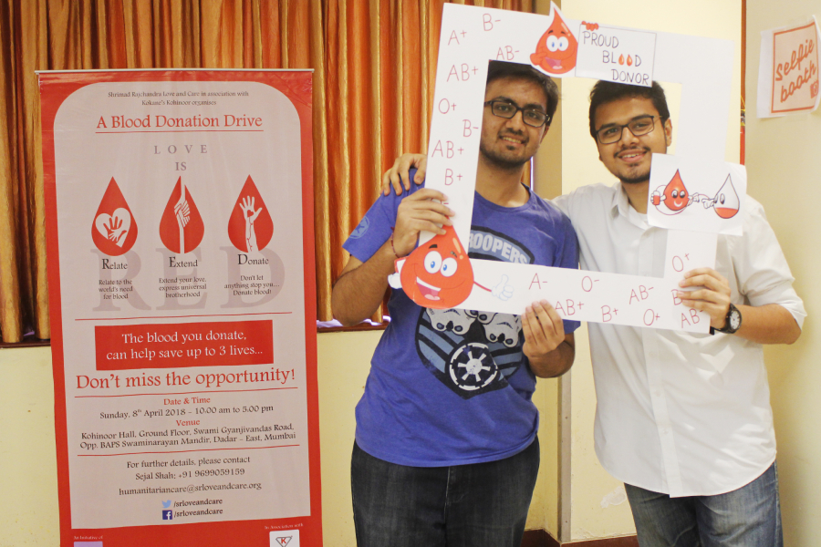 Enthusiastic donors say “Love is RED” at blood donation camps